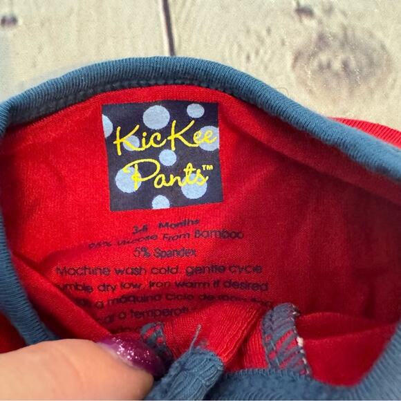 Kickee Pants Red and Navy Blue Ruffle American Flag Bamboo Footless Romper - Picture 2 of 3